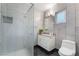 Modern bathroom featuring a glass-enclosed shower and updated vanity at 2200 Santa Ynez Dr, Las Vegas, NV 89104