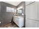 Renovated bathroom featuring double sinks, vanity, and tile floor at 2200 Santa Ynez Dr, Las Vegas, NV 89104