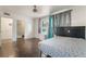 Cozy bedroom with en suite bathroom, hardwood floors, and natural light at 2200 Santa Ynez Dr, Las Vegas, NV 89104