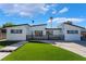 Inviting single-story home with a well-manicured lawn and updated exterior, offering curb appeal and charm at 2200 Santa Ynez Dr, Las Vegas, NV 89104