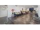 Spacious living room with tile floors, comfortable seating, and a stone fireplace, ideal for relaxation at 2200 Santa Ynez Dr, Las Vegas, NV 89104