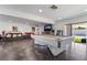Open concept living room with a pool table and access to the pool at 2200 Santa Ynez Dr, Las Vegas, NV 89104