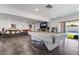 Spacious living room with a pool table and access to the pool at 2200 Santa Ynez Dr, Las Vegas, NV 89104