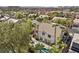 Aerial back view of a two story home, featuring a tile roof and well-maintained landscaping at 253 White Willow Ave, Las Vegas, NV 89123