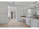 Bathroom featuring double sinks, granite counters, walk-in shower, and vanity at 253 White Willow Ave, Las Vegas, NV 89123