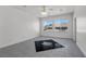 Large bedroom with gray tile flooring and a unique inlaid pattern at 253 White Willow Ave, Las Vegas, NV 89123