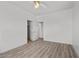 Bedroom featuring modern flooring, neutral walls, and a walk in closet at 253 White Willow Ave, Las Vegas, NV 89123