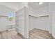 Bright walk-in closet with custom shelving and a window at 253 White Willow Ave, Las Vegas, NV 89123