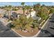 Corner lot home featuring manicured landscaping and mature trees at 253 White Willow Ave, Las Vegas, NV 89123