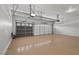 Spacious three car garage features epoxy floors and automatic doors at 253 White Willow Ave, Las Vegas, NV 89123