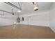 Oversized garage with epoxy floors and side doors to the exterior at 253 White Willow Ave, Las Vegas, NV 89123