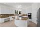 Spacious kitchen with granite countertops and stainless steel appliances at 253 White Willow Ave, Las Vegas, NV 89123