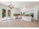 Large kitchen with white cabinets, granite counters and stainless appliances at 253 White Willow Ave, Las Vegas, NV 89123