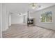 Large living room featuring tile fireplace, wood floors and plenty of space at 253 White Willow Ave, Las Vegas, NV 89123