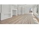 Living room with built in shelving and luxury vinyl plank flooring at 253 White Willow Ave, Las Vegas, NV 89123