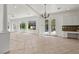 Spacious living room with natural light and tile and wood floors at 253 White Willow Ave, Las Vegas, NV 89123