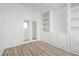 Office featuring custom built-in shelving and cabinets and natural light at 253 White Willow Ave, Las Vegas, NV 89123