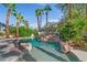Inviting backyard pool with rock waterfall feature at 253 White Willow Ave, Las Vegas, NV 89123