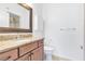 Bathroom featuring granite countertop, framed mirror, and medicine cabinet at 2615 W Gary Ave # 1041, Las Vegas, NV 89123