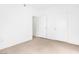 A bright bedroom with neutral carpet and white walls, ready for personalization at 2615 W Gary Ave # 1041, Las Vegas, NV 89123