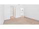Bedroom featuring carpet floors and a door to an en-suite bathroom at 2615 W Gary Ave # 1041, Las Vegas, NV 89123
