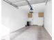 An empty garage featuring cabinets and concrete floor at 2615 W Gary Ave # 1041, Las Vegas, NV 89123
