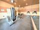 Community gym with fitness machines, neutral paint scheme, and ceiling fans at 2615 W Gary Ave # 1041, Las Vegas, NV 89123