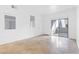 Bright living room with windows and a sliding door leading to a patio at 2615 W Gary Ave # 1041, Las Vegas, NV 89123