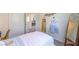 Stylish bedroom with single bed, dress-up clothes, and a full-length mirror at 2633 Begonia Falls Ave # 88, North Las Vegas, NV 89081