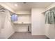Organized walk-in closet with ample shelving and hanging space, providing efficient storage solutions at 2633 Begonia Falls Ave # 88, North Las Vegas, NV 89081