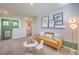 Comfortable loft area featuring cozy seating, modern decor, and convenient access to laundry at 2633 Begonia Falls Ave # 88, North Las Vegas, NV 89081