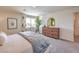 Bright and airy main bedroom with a large window, stylish decor and neutral palette at 2633 Begonia Falls Ave # 88, North Las Vegas, NV 89081