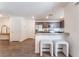 Eat-in kitchen featuring stainless steel appliances, ample counter space, and convenient seating at 2691 Mango Light Ave, North Las Vegas, NV 89086
