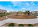 Community playground with modern play structures, open space and beautiful landscaping for outdoor fun at 2691 Mango Light Ave, North Las Vegas, NV 89086