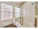 Bathroom featuring a gold-framed shower and window at 2753 Port Of Call Dr, Las Vegas, NV 89128