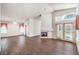 Bright and airy living room featuring a fireplace and access to the patio at 2753 Port Of Call Dr, Las Vegas, NV 89128