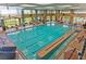 Indoor pool with lap lanes and seating areas, perfect for year-round swimming and fitness at 2810 Somerset Springs Dr, Henderson, NV 89052