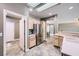 Spacious kitchen with stainless steel fridge, light cabinets, and adjacent breakfast nook at 2810 Somerset Springs Dr, Henderson, NV 89052