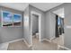 Neutral bathroom featuring tile floors and a window at 3192 Timorasso Ave, Henderson, NV 89044