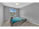 Bedroom showcasing a bed, window with blinds, and neutral color palette at 3192 Timorasso Ave, Henderson, NV 89044