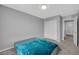 Bedroom featuring a bed, carpeted floor, and a closet with sliding doors at 3192 Timorasso Ave, Henderson, NV 89044