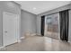 Bright, modern bedroom features a sliding glass door and neutral decor at 3192 Timorasso Ave, Henderson, NV 89044