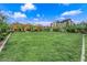 Spacious community green with trees, landscaping and walkways providing a pleasant and inviting outdoor area at 3192 Timorasso Ave, Henderson, NV 89044