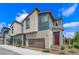 Well-maintained home with modern exterior, two-car garage, and landscaped front yard at 3192 Timorasso Ave, Henderson, NV 89044