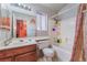 Cozy bathroom featuring a vanity, toilet, and shower-tub combo at 3443 Citruscedar Way, North Las Vegas, NV 89032