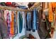 Organized walk-in closet with ample storage for clothes and accessories at 3443 Citruscedar Way, North Las Vegas, NV 89032