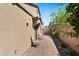 Relaxing backyard with a brick-paved patio and a well-maintained landscape at 3709 Neblina Dr, Henderson, NV 89052
