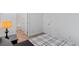 Bedroom with a wood-framed bed and a view of the bathroom and closets at 3709 Neblina Dr, Henderson, NV 89052