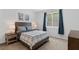 Cozy bedroom featuring a comfortable bed, soft lighting, and stylish decor at 3709 Neblina Dr, Henderson, NV 89052