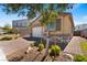 Charming single-story home featuring a brick driveway and a two-car garage, plus desert landscaping at 3709 Neblina Dr, Henderson, NV 89052